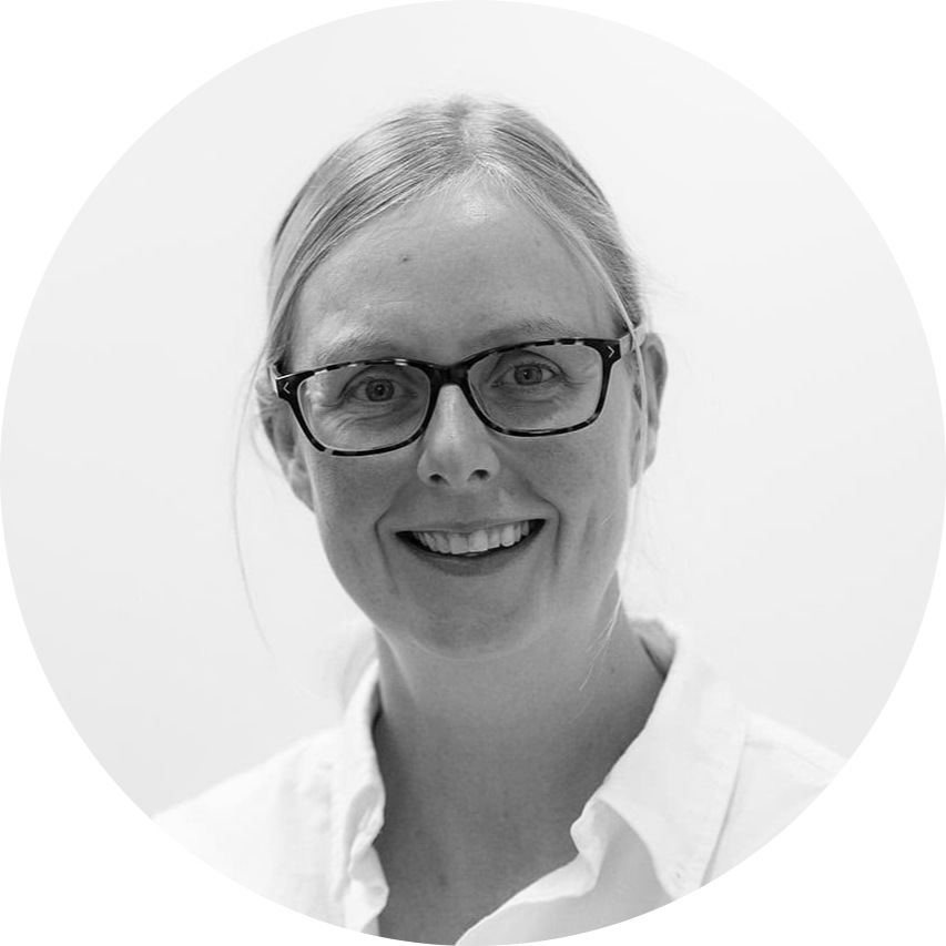 grayscale profile silhouette of a unisex human head inside a clean circular frame