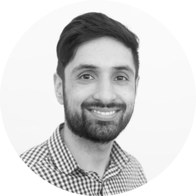 grayscale profile silhouette of a unisex human head inside a clean circular frame